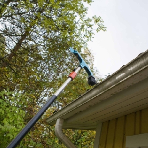 Tagrenderens med teleskopbørste