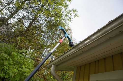 Tagrenderens med teleskopbørste